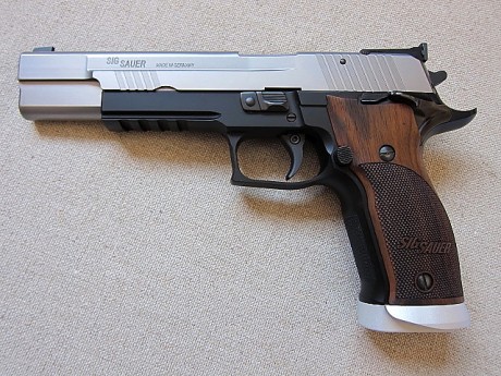 a la venta mi magnífica y más que cuidada pistola 9 mm. parabelum de 6", diseñada por la prestigiosa 12