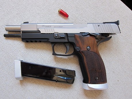 a la venta mi magnífica y más que cuidada pistola 9 mm. parabelum de 6", diseñada por la prestigiosa 21
