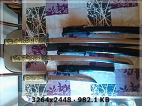 Hola, tengo dudas sobre el valor de un juego de katanas antiguas, me podrías verificar si son o no son 40