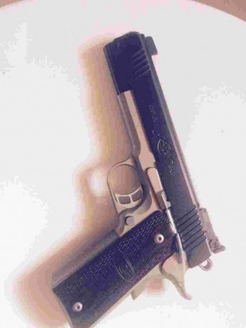 PUES ESO, se pone a la venta esta preciosidad , para financiar otro proyecto , es una pistola kimber cal. 62