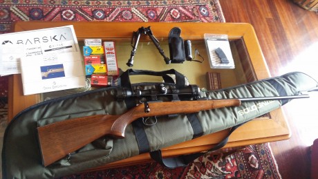 Se vende Carabina . 22 CZ 452 ZKM con mira BARSKA de 9x40 regulada en banco de tiro en galería, en buen 02