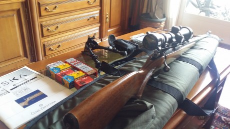 Se vende Carabina . 22 CZ 452 ZKM con mira BARSKA de 9x40 regulada en banco de tiro en galería, en buen 01