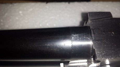 Tengo una beretta 692 nueva con 200 tiros, y ayer al desmontarla vi unos arañazos en el cañon en la parte 81