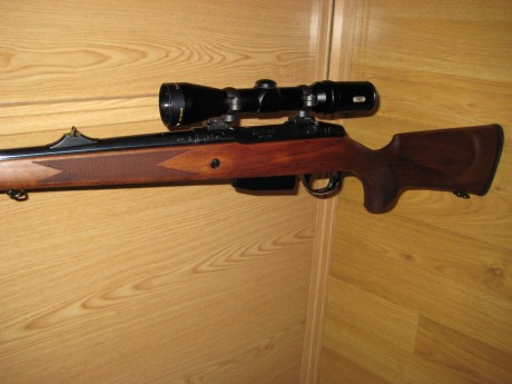 hola un familiar me ha pedido que ponga a la venta su rifle de cerrojo se trata de un Carl gustaf 2000 11