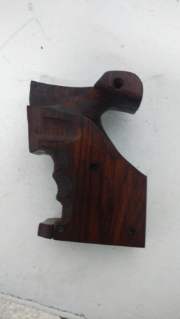 hola vendo unas cachas seminuevas de madera de cocobolo para revolver armazon K o L su estado es impecable 00