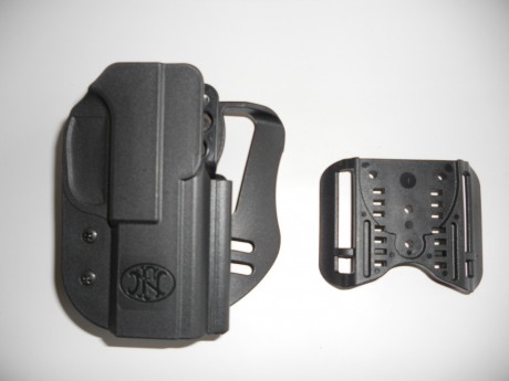 VENDO FN P9M EN 9mm/Pb. Comprada y guiada en mayo de 2014.Únicamente 50 disparos efectuados ni uno mas 11