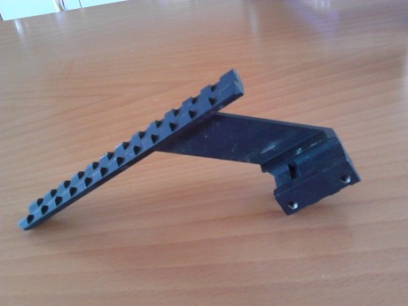 hola pues eso cacharrada:
 rail pistola para poder montar red dot o visor   15 euros
 rail para antorcha 02