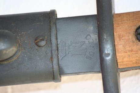 He comprado esta bayoneta mod 1941 pero no se si es original las cachas y el fosfatado, puede ser algún 01