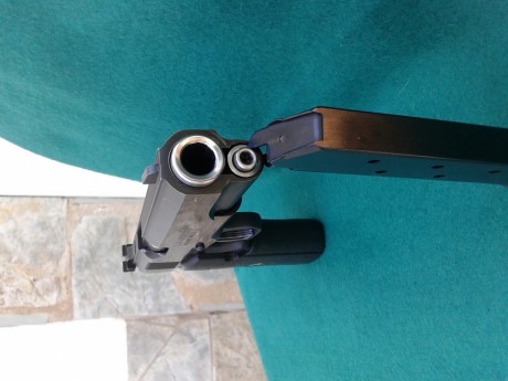    Buenas tardes, pongo a la venta una pistola Colt 1911 modelo Gold Cup  National Match Serie´s 80 en 00