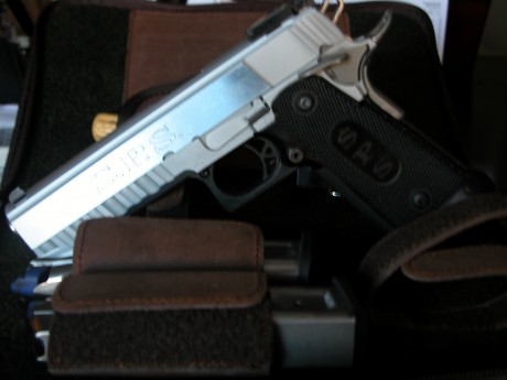vendo pistola SPS  como nueva con muy pocos disparos practica mente nueva
con dos cargadores de 16 balas 00