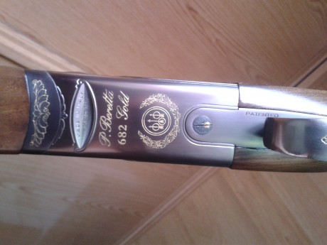 hola vendo escopeta superpuesta Beretta 682 gold sporting calibre 12 tiene cañones de 75 cms de largo 00