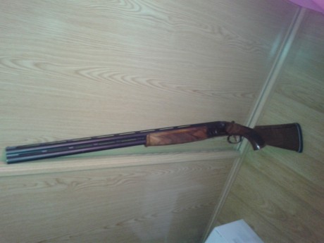 hola vendo escopeta superpuesta Beretta 682 gold sporting calibre 12 tiene cañones de 75 cms de largo 20