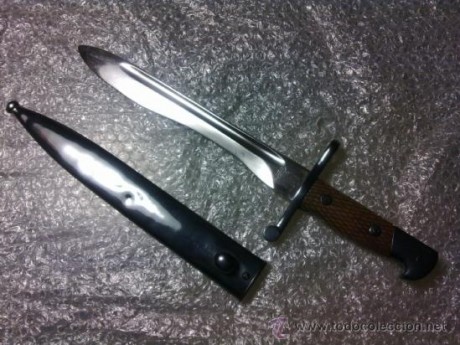 He comprado esta bayoneta mod 1941 pero no se si es original las cachas y el fosfatado, puede ser algún 132