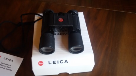 Vendo primáticos Leica Trinovid 10x25 BCA. de bolsillo. Buen estado, con su documentación, garantia y 01
