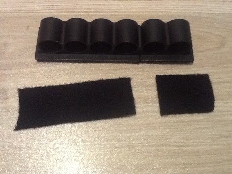Se vende porta cartuchos lateral para escopeta construido en aluminio por NCStar n muy buen estado y divisible 00