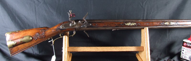 Hola, voy a intentar poner unas fotos de este arma que he encontrado mirando por la web. Es un rifle rapido 00