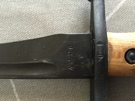 He comprado esta bayoneta mod 1941 pero no se si es original las cachas y el fosfatado, puede ser algún 20