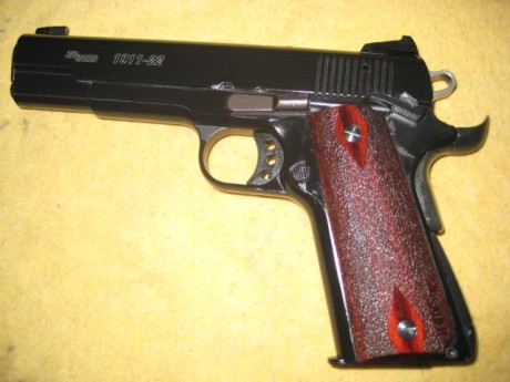 Hola un amigo vende Sig-Sauer 1911-22, (calibre 22), está como nueva, precio 250 euros, más 20 de portes 12