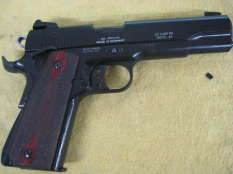 Hola un amigo vende Sig-Sauer 1911-22, (calibre 22), está como nueva, precio 250 euros, más 20 de portes 11