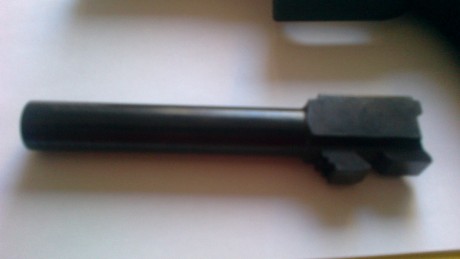 Vendo o cambio Glock 17 +kit del 22 solo estrenada 25 disparos con el 9mm y 25 disparos con el 22 Lr.

Las 12