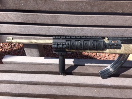 cambio ruger 10/22 con guardamanos tactico de la marca UTG, con todo lo que venia e instrucciones, cargador 02