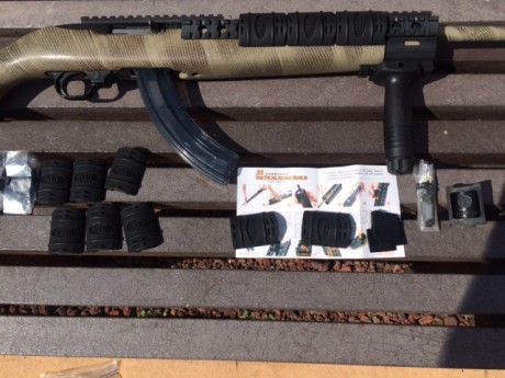 cambio ruger 10/22 con guardamanos tactico de la marca UTG, con todo lo que venia e instrucciones, cargador 00