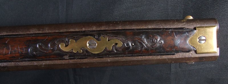Hola, voy a intentar poner unas fotos de este arma que he encontrado mirando por la web. Es un rifle rapido 20
