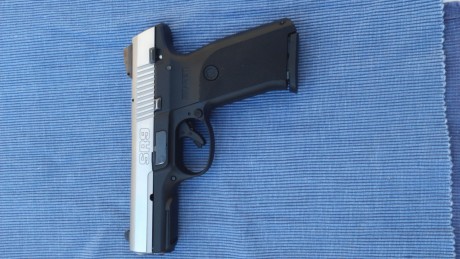 Hola amigos, cambio mi ruger modelo SR9, por pistola compacta tipo sw bodyguard etc. 00