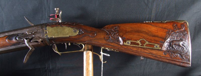 Hola, voy a intentar poner unas fotos de este arma que he encontrado mirando por la web. Es un rifle rapido 30