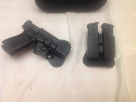  image.jpg  image.jpg  image.jpg Vendo el conjunto de funda y porta cargadores para Glock 17-19 son giratorias 00