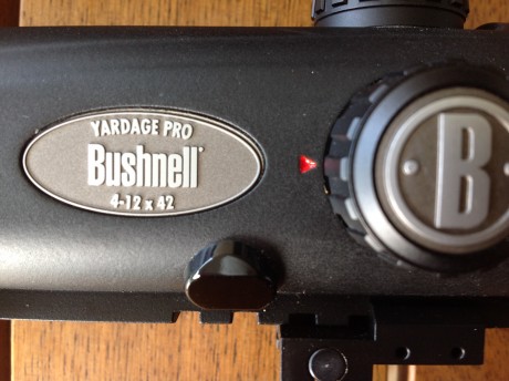 Visor Bushnell modelo pro 4x12x42 con Telemetro láser incorporado. Retícula mildot.
Incluye tapas protectoras, 01