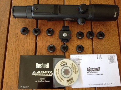 Visor Bushnell modelo pro 4x12x42 con Telemetro láser incorporado. Retícula mildot.
Incluye tapas protectoras, 00