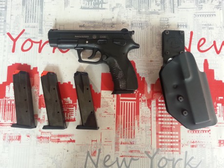 Vendo una K100,sin tiradas de IPSC, solo probada para ver que funciona. Va con cuatro cargadores y funda, 02