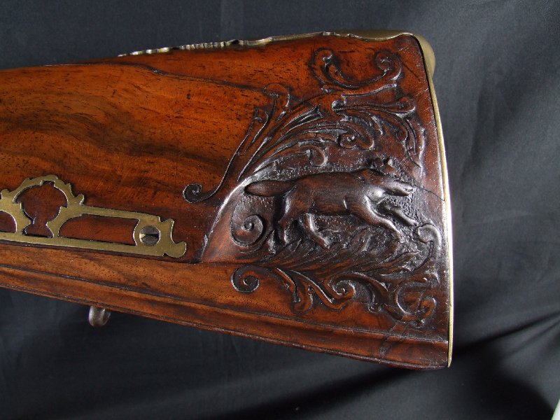 Hola, voy a intentar poner unas fotos de este arma que he encontrado mirando por la web. Es un rifle rapido 41