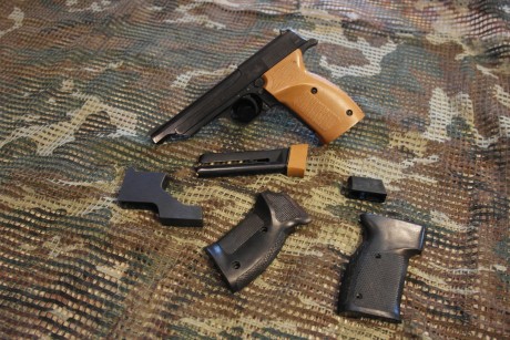 Hola. Por abandono de la licencia F vendo mis últimas armas cortas.

Norinco TT Olimpia: Es ligera, dura 01