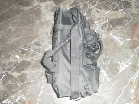 vendo esta estupenda bolsa para tiro muy practica y con multiples bosillos , esta perfecta sin desgaste 01