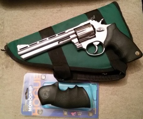   Hola de nuevo! 

Pongo en venta en Madrid mi revólver Taurus  del .357MG/.38 SPL de 6", prefiero 00