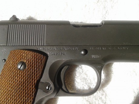 Vendo pistola Colt 1911, Cal. 45 ACP (año 1943). Tiene el acabado original US Army en parkerizado marrón. 00