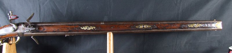 Hola, voy a intentar poner unas fotos de este arma que he encontrado mirando por la web. Es un rifle rapido 52