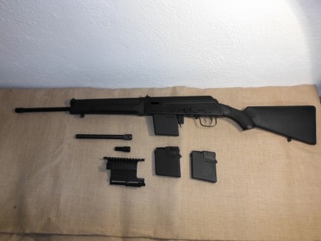 Se vende escopeta semiautomática prácticamente nueva. Marca Izhmash modelo Saiga 410, calibre 410 magnum, 01