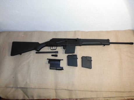 Se vende escopeta semiautomática prácticamente nueva. Marca Izhmash modelo Saiga 410, calibre 410 magnum, 00