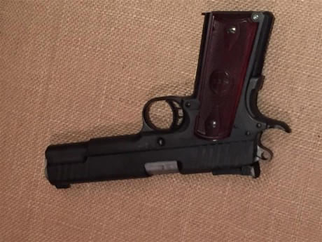 VENDO

Pistola STI TROJAN, cañón de 5'
Calibre 9mm Parabellum

Cargador Monohilera
Cachas de Palo Rosa

Tira 02