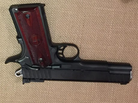 VENDO

Pistola STI TROJAN, cañón de 5'
Calibre 9mm Parabellum

Cargador Monohilera
Cachas de Palo Rosa

Tira 00