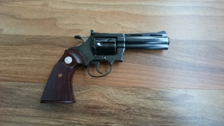 Este es el cambio;
Colt Diamondback 38 - 4" - 
Muy buen estado, pavón y canchas intactos 
Juego de 01
