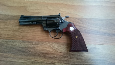 Este es el cambio;
Colt Diamondback 38 - 4" - 
Muy buen estado, pavón y canchas intactos 
Juego de 00