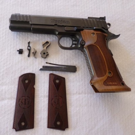 Un amigo que deja el tiro me pide que le ponga a la venta esta STI TROJAN 5", impecable, con muy 02