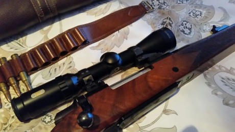 Se vende Rifle de caza BROWNING calibre 300 con mira telescópica TASCO TITAN (1. 5x6x42)  + canana + funda 00