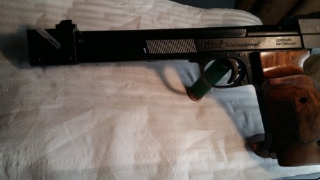 Lodicho que vendo la HAMMERLI calibre 22 muy bien conservada como se puede ver en las fotos cañon a espejo, 02