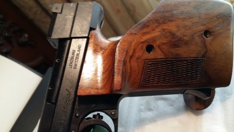 Lodicho que vendo la HAMMERLI calibre 22 muy bien conservada como se puede ver en las fotos cañon a espejo, 12