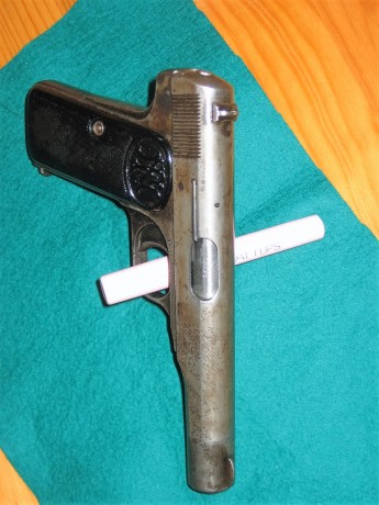 Hola. Vendo FN 1922, calibre 7.65 (32 Acp) en libro de coleccionista. Con marcajes alemanes en armazón 12
